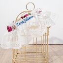 Podwiązka ślubna z jedwabiu naturalnego z personalizowanym haftem