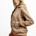 Bluza na zamek Mela - beżowa damska z kapturem