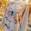 Beżowa bluza z kolorowym motylem - rozmiar S/M (lekki oversize)