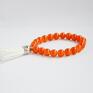 bransoletka handmade wykonana jest z 8mm szklanych korali w kolorze pomarańczowy