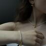 złota bransoletka z białych pereł swarovski® crystal z kokardką perly
