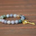 Bracelet by SIS: kamienie półszlachetne agat ze złotym kluczem