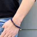 Bransoletka z perłami naturalnymi w kolorze granatowym z fioletowym overtonem