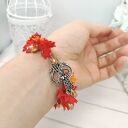 Bransoletka jesienna z miniaturowymi kanadyjskimi listkami czerwono -żółtymi glina polimerowa