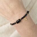 Makramowa bransoletka ochronna z turmalinem, onyksem i nocą Kairu, czarna