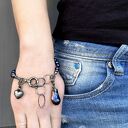 Bransoletka z perłami naturalnymi w kolorze granatowym z fioletowym overtonem