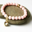 Bransoletka jadeit z zawieszką na gumce - handmade, złote dodatki