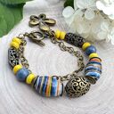 Ceramiczna bransoletka z niebieskimi i żółtymi akcentami c653