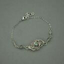 Bransoletka regulowana z zielonym labradorytem - wire wrapping i stal chirurgiczna
