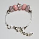 Różowa bransoletka handmade z transparentnej linki kauczukowej i koralikami ze szkła Murano