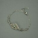 Bransoletka regulowana z zielonym labradorytem - wire wrapping i stal chirurgiczna