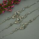 Bransoletka regulowana z zielonym labradorytem - wire wrapping i stal chirurgiczna