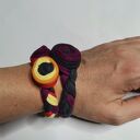 Kolorowa bransoletka dzianinowa folk boho - rozetki, długość uniwersalna