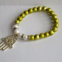 Bracelet by SIS: limonkowe korale z ręką fatimy przynoszoszącą szczęście
