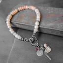 Bransoletka z różowego opalu z zawieszką