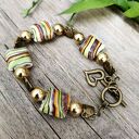 Bransoletka z kwadratowymi koralami z porcelany w103