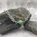 Bransoletka chainmaille - zoisyt z rubinem