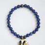 Bransoletka handmade wykonana z 6mm kamieni półszlachetnych, lapis lazuli. Całość ozdobiona jest charmsem. Panda