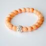 Bracelet by SIS: cyrkonie w jasno pomarańczowych kamieniach marmur prezent