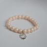 Bracelet by SIS: hamsa w pudrowych perłach pastele perły
