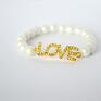 Bracelet by SIS: cyrkoniowy napis LOVE w białych perłach perły prezent