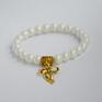 Bracelet by SIS modne kokardka handmade wykonana jest z 8mm szklanych pereł w kolorze złoto bransoletka