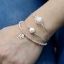 Posrebrzana bransoletka ze słodkowodną perłą. Naturalność w połączeniu z klasyczną elegancją - bardzo kobiecy. Lekka