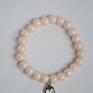 Bracelet by SIS: hamsa w pudrowych perłach