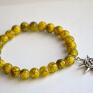 Bracelet by SIS: elegancka bransoletka z żółto - czarnych korali słońce