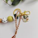 Brelok drewniany z monsterą - ozdoba do torebki w stylu boho