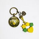 Breloczek - Żółty kwiat, serce