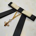 Czarna broszka z pszczółką - elegancka kokarda handmade