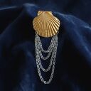 Broszka z prawdziwej muszli: złota łańcuszkami