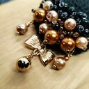 Broszka czarna szydełkowa ze szklanymi perełkami i kokardą (KR/19/26)