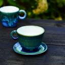 Porcelanowa filiżanka w kolorze niebiesko-zielonym