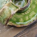 Ceramiczny kaganek na palo santo Monstera c819