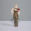 Anioł z kwiatem we włosach