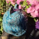 Ceramiczna skarbonka w kształcie grubego kotka