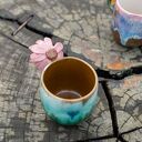 Różowy kubek ceramiczny z kwiatkiem (ok. 450 ml)