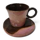 Ręcznie robiona filiżanka ceramiczna z podstawką