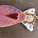 anioł ceramiczny uśmiechnięty