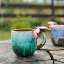 Różowy kubek ceramiczny z kwiatkiem (ok. 450 ml)