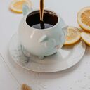 Miętowa filiżanka w kształcie kotka Kiziora - Lamabo Ceramics