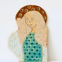 Ceramiczny anioł stróż