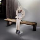 Anioł ceramiczny siedzący