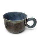 Ręcznie robiony ceramiczny kubek w odcieniach niebieskiego i brązu