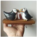 Wieszak z 2 maskonurami