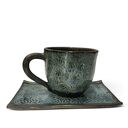 Ręcznie robiona filiżanka ceramiczna z podstawką