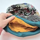 Czapka sztuczne futro połączone z materiałem trochę w marokańskim stylu krótka na podszewce wykończo