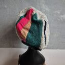 Czapka patchworkowa bardzo ciepła na podszewce uszyta z różnych gatunków materiału prezentuje się ni